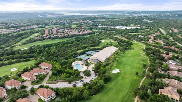 birds eye view of property with a water view, a residential view, and golf course view