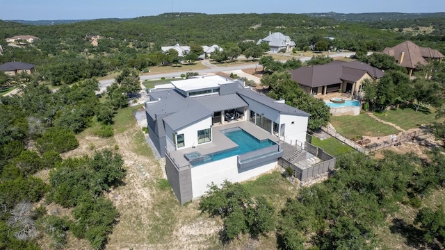 aerial view with a wooded view