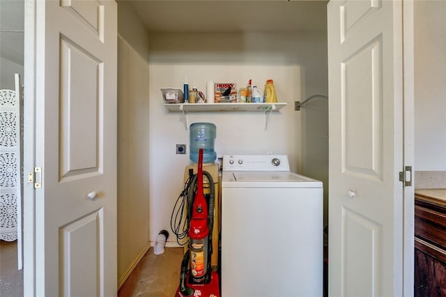 washroom with washer / dryer, baseboards, and laundry area