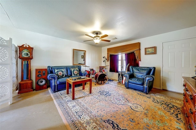 living room featuring ceiling fan and visible vents