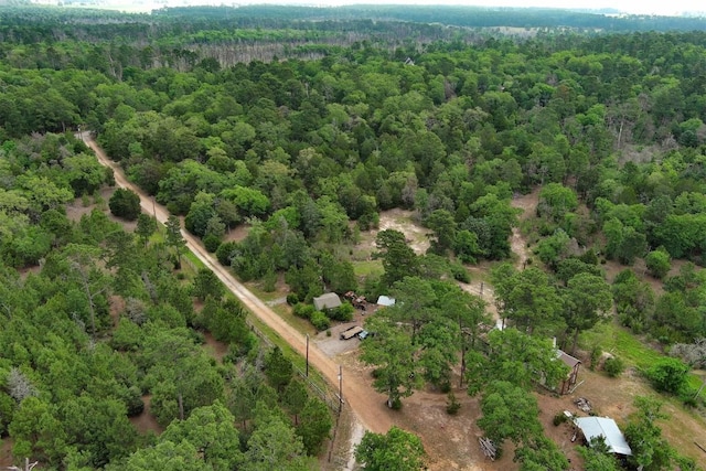 125 Turkey Trot Rd, Smithville, TX 78957 - birds eye view of property with a wooded view