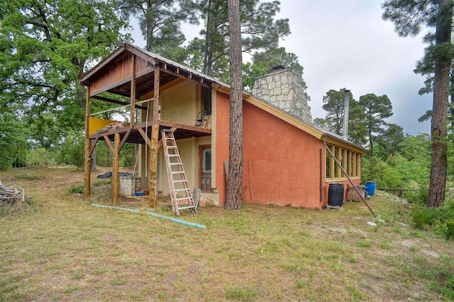 125 Turkey Trot Rd, Smithville, TX 78957 - view of outdoor structure with central air condition unit and stairway
