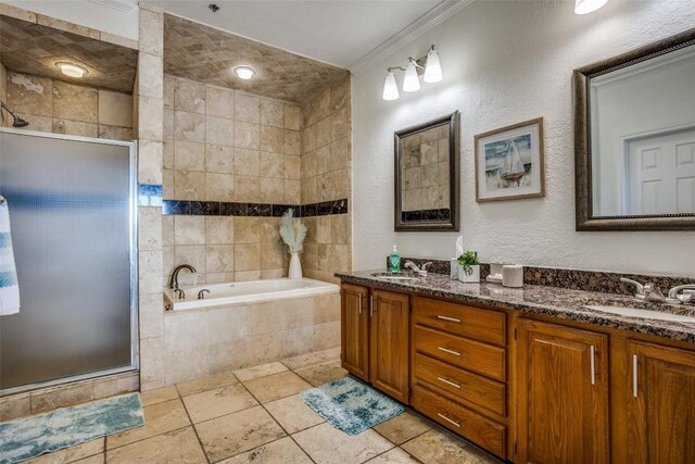 3404 American Dr Unit 2306, Lago Vista, TX 78645 - bathroom with a sink, crown molding, a stall shower, and a garden tub