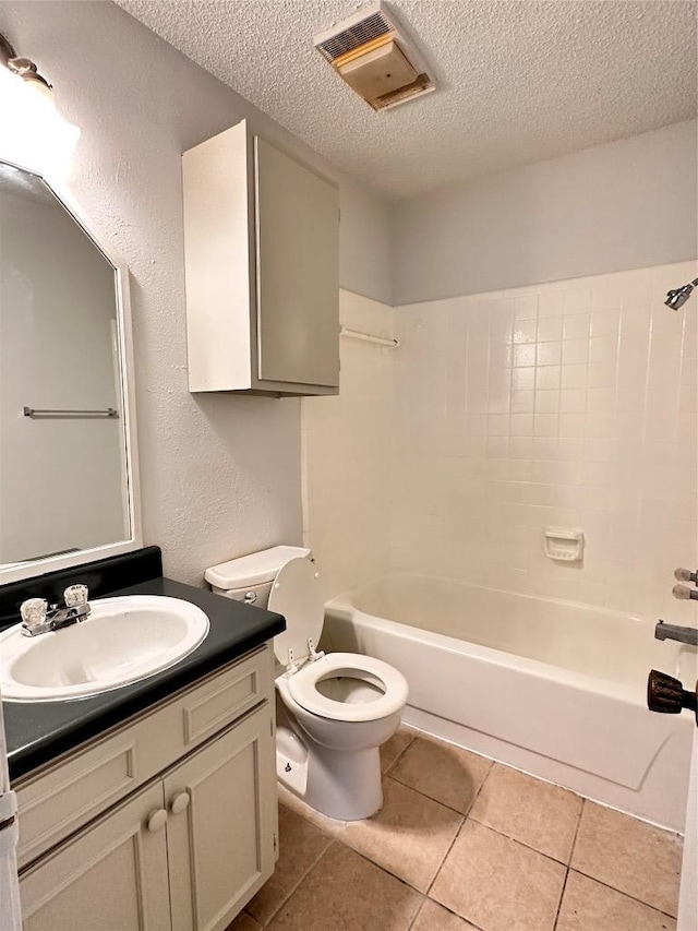 full bathroom with a textured ceiling, visible vents, tile patterned flooring, vanity, and toilet