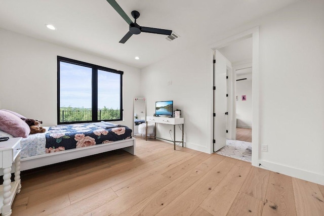 bedroom with ceiling fan, visible vents, baseboards, wood-type flooring, and recessed lighting