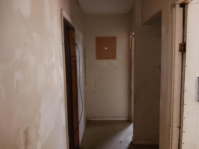 corridor with concrete floors