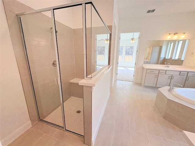 1728 Scenic Heights Ln, Georgetown, TX 78628 - bathroom with tile patterned floors, a stall shower, vanity, and healthy amount of natural light