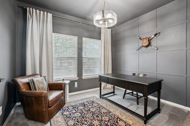 office with baseboards, an inviting chandelier, and carpet
