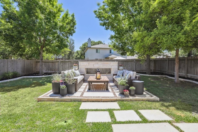 view of yard featuring a patio, a fenced backyard, and outdoor lounge area