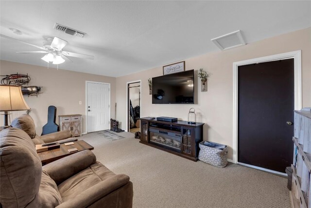 1309 E Brown St, Llano, TX 78643 - carpeted living room with attic access and a ceiling fan