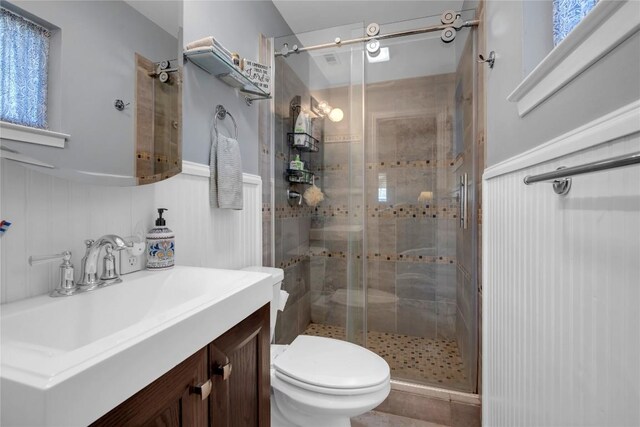 1309 E Brown St, Llano, TX 78643 - full bathroom featuring vanity and a shower stall