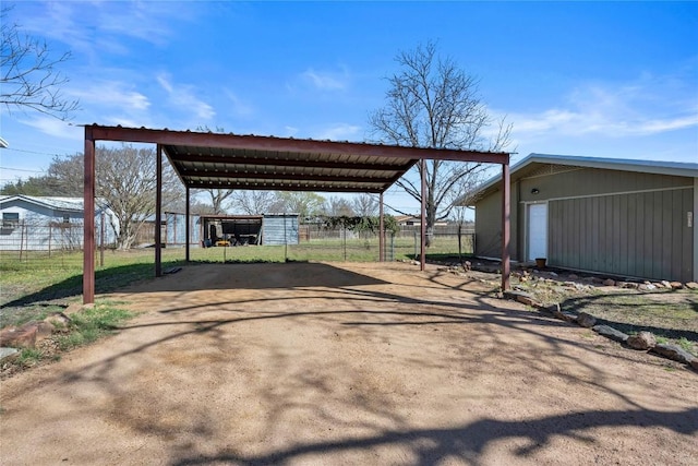 1309 E Brown St, Llano, TX 78643 - view of parking with a carport and driveway