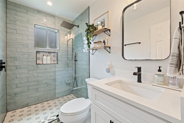 bathroom with toilet, walk in shower, recessed lighting, and vanity