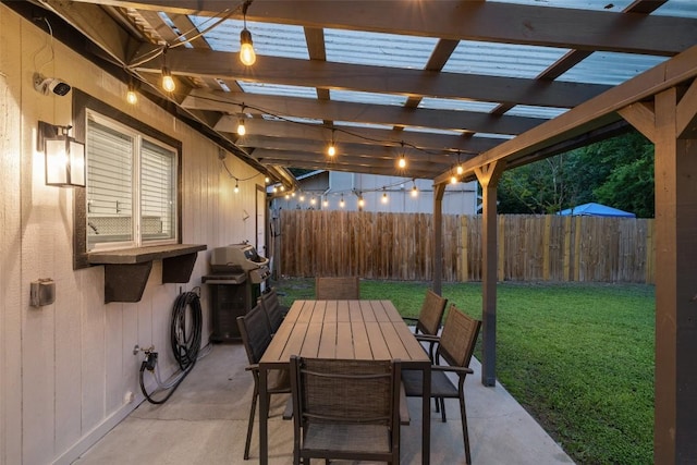 view of patio featuring area for grilling, a pergola, fence, and outdoor dining space