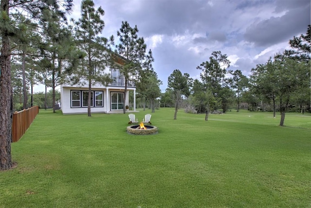 141 Awehi Ln, Bastrop, TX 78602 - view of yard featuring a fire pit