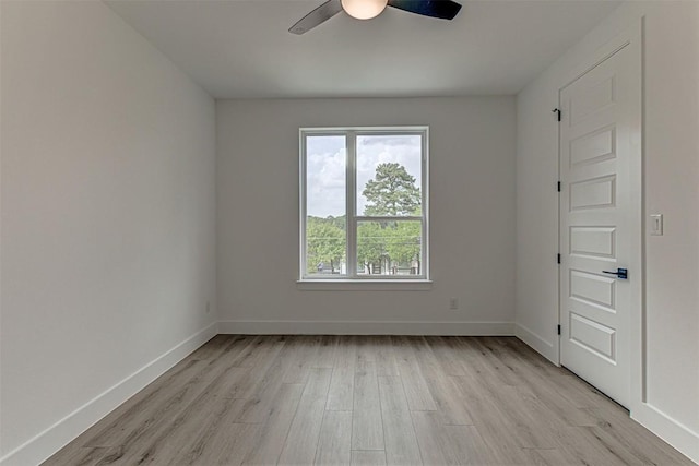 141 Awehi Ln, Bastrop, TX 78602 - empty room with light wood-type flooring, a ceiling fan, and baseboards