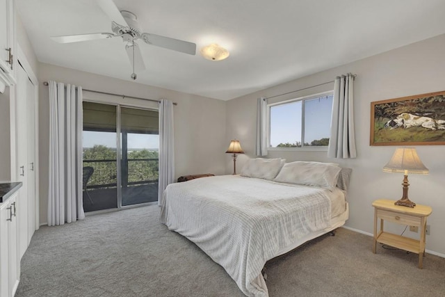 1871 Patty Dr, Canyon Lake, TX 78133 - bedroom featuring access to exterior, light colored carpet, and a ceiling fan