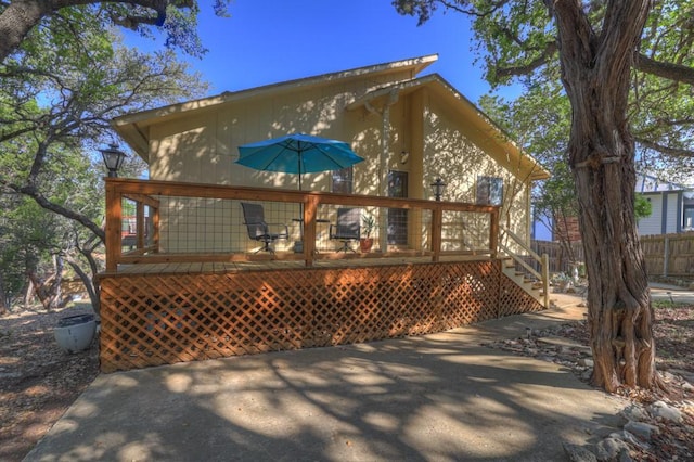 wooden deck featuring fence