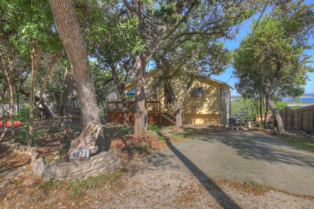 1871 Patty Dr, Canyon Lake, TX 78133 - view of front of house featuring a deck and stairway