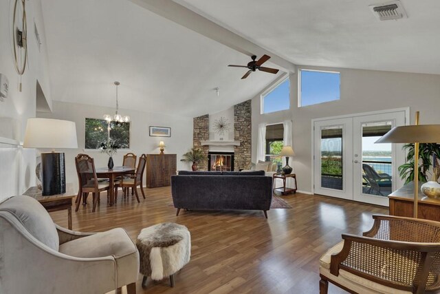 1871 Patty Dr, Canyon Lake, TX 78133 - living area featuring high vaulted ceiling, ceiling fan, beam ceiling, wood finished floors, and a chandelier
