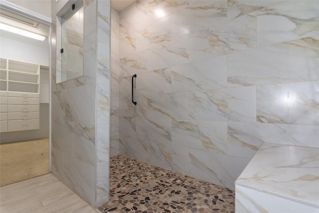 bathroom with a walk in shower