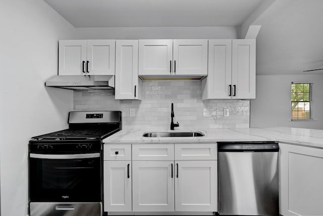 kitchen with a sink, stainless steel appliances, white cabinetry, and under cabinet range hood