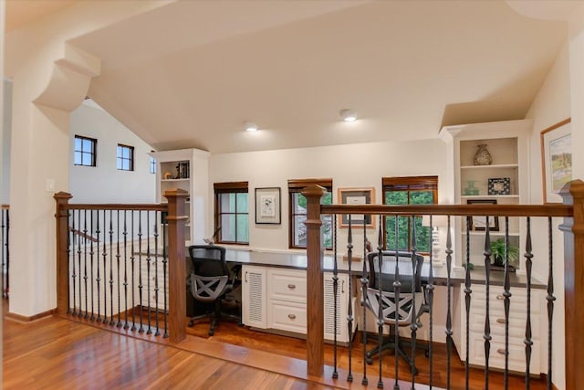 office featuring wood finished floors and built in study area
