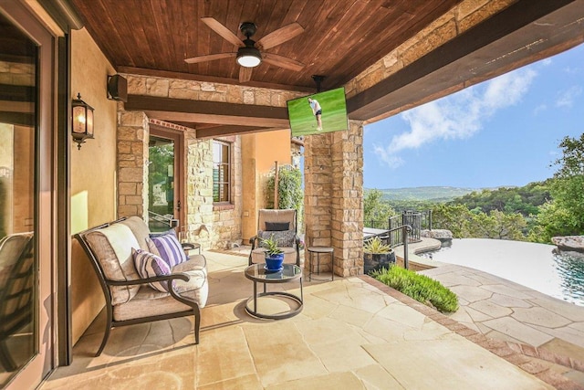 view of patio with a ceiling fan