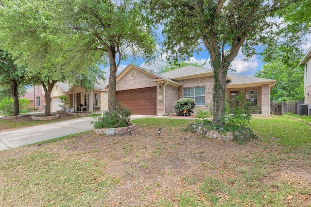 ranch-style home with fence, brick siding, a garage, central AC unit, and driveway