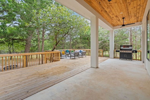 deck featuring an outdoor hangout area and a grill