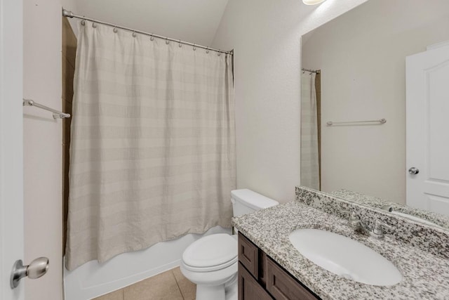 full bath with toilet, tile patterned floors, shower / bath combination with curtain, and vanity