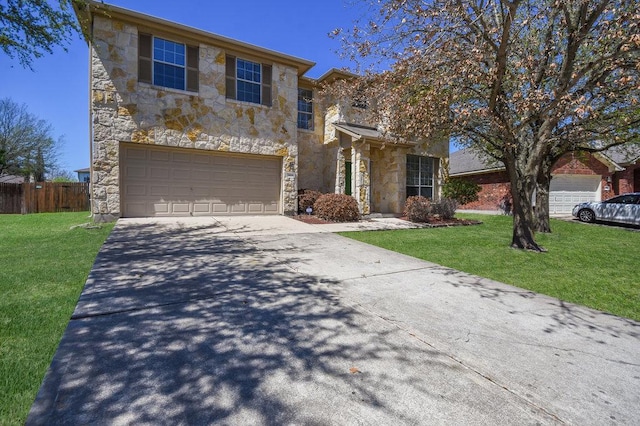 18816 Sandy Shore Dr, Pflugerville, TX 78660 - view of front of house featuring fence, driveway, stone siding, and a front lawn
