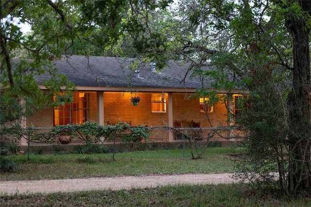 991 Fm 20, Cedar Creek, TX 78612 - view of front facade featuring brick siding and a shingled roof