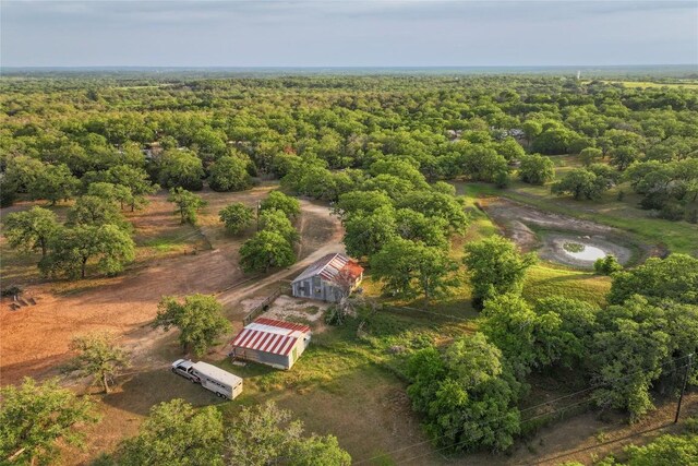 bird's eye view featuring a view of trees