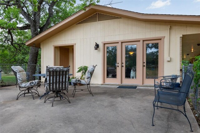 view of patio with fence and french doors