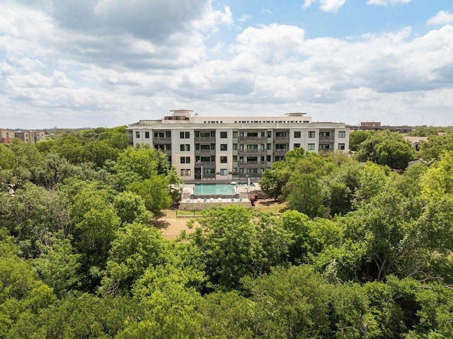 view of property with an outdoor pool