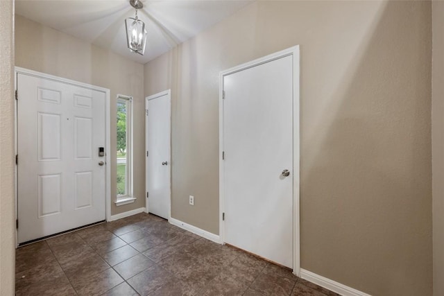349 Eagle Brook Ln, Buda, TX 78610 - tiled entryway with baseboards