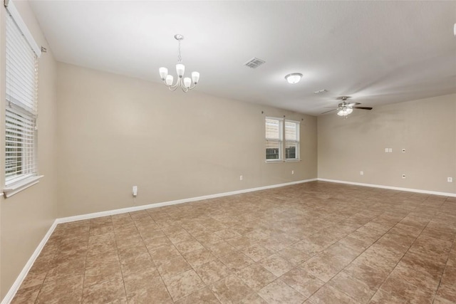 349 Eagle Brook Ln, Buda, TX 78610 - empty room featuring a ceiling fan, a chandelier, and baseboards