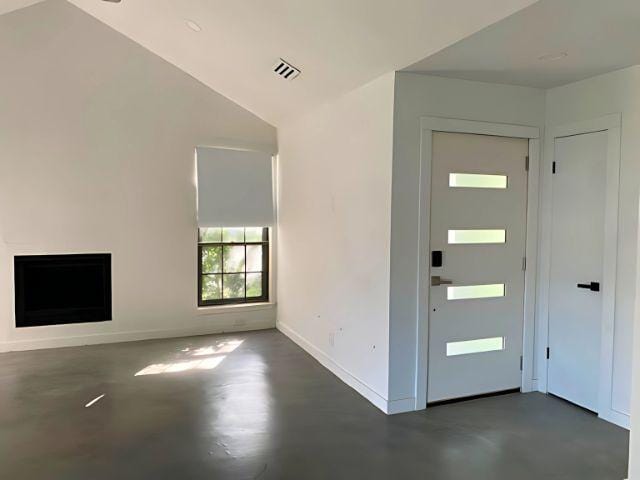4307 Glenover, San Antonio, TX 78217 - entryway featuring concrete flooring, baseboards, and a fireplace