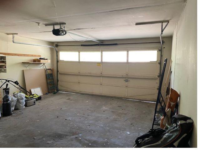 4307 Glenover, San Antonio, TX 78217 - garage featuring a garage door opener