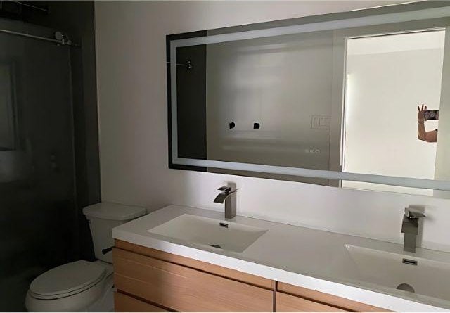 4307 Glenover, San Antonio, TX 78217 - bathroom featuring toilet and vanity