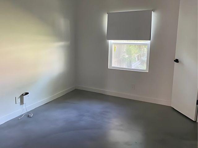 4307 Glenover, San Antonio, TX 78217 - unfurnished room featuring finished concrete floors and baseboards
