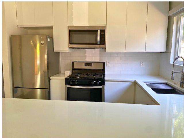 4307 Glenover, San Antonio, TX 78217 - kitchen featuring light countertops, stainless steel appliances, tasteful backsplash, and a sink