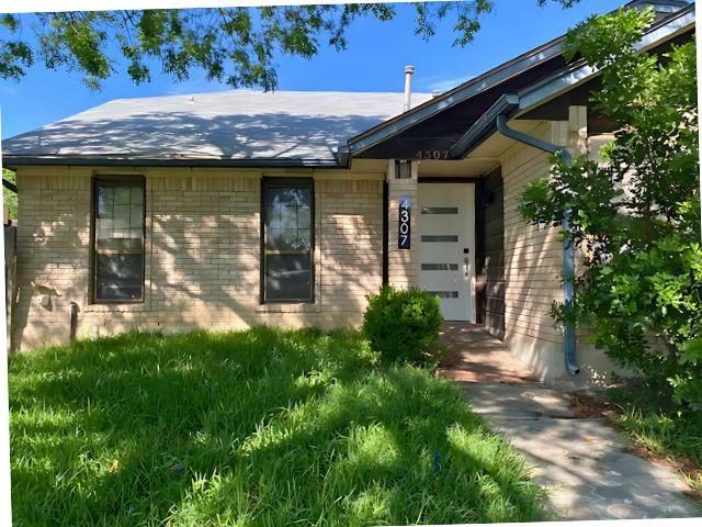 4307 Glenover, San Antonio, TX 78217 - doorway to property with brick siding