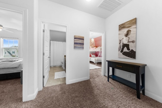 19600 Summit Glory Trl, Spicewood, TX 78669 - corridor featuring visible vents, carpet flooring, and baseboards