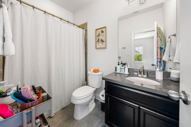19600 Summit Glory Trl, Spicewood, TX 78669 - bathroom with vanity, toilet, curtained shower, and visible vents