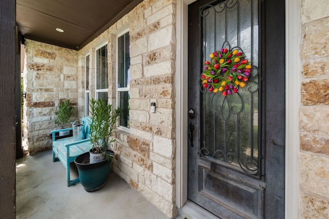 19600 Summit Glory Trl, Spicewood, TX 78669 - entrance to property featuring covered porch and stone siding