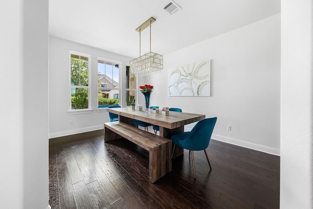 19600 Summit Glory Trl, Spicewood, TX 78669 - dining area with visible vents, baseboards, dark wood finished floors, and an inviting chandelier