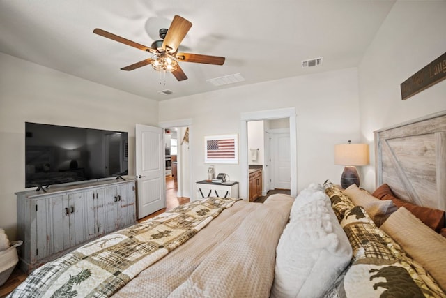 711 Livewater Ln, Georgetown, TX 78633 - bedroom featuring ceiling fan and connected bathroom