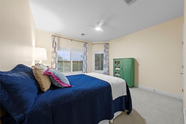 7921 W Rim Dr, Austin, TX 78731 - bedroom featuring light carpet and ceiling fan